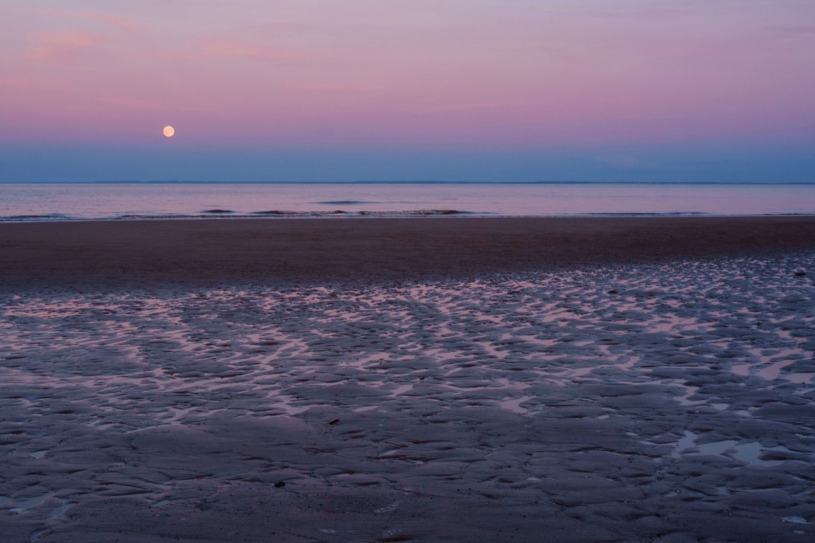 The strawberry moon rises over the North Sea